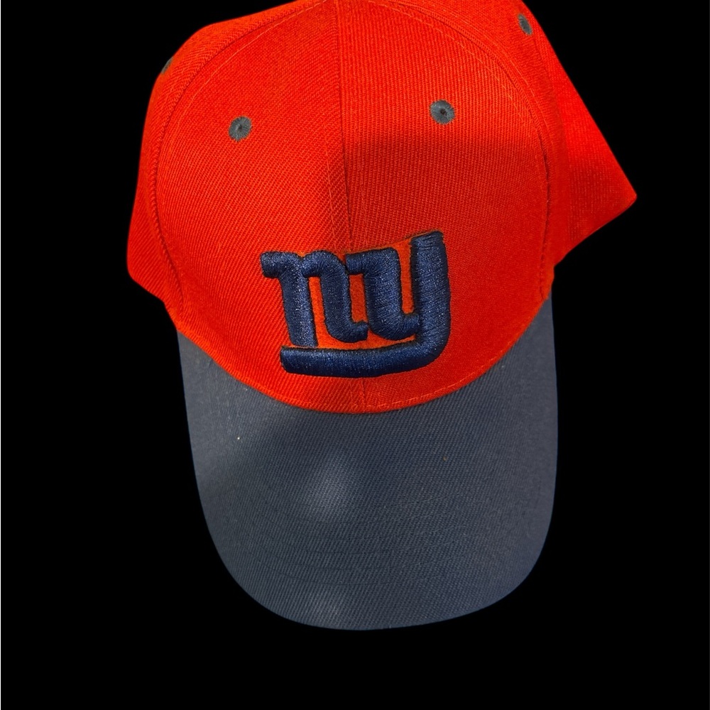 NY football Giants Red with blue bill Cap
Snapback adjustable one size fits all